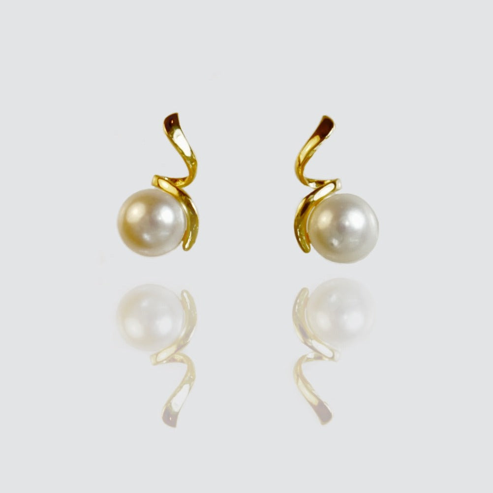 White Freshwater Pearl Swirl Shape Earrings In Sterling Silver