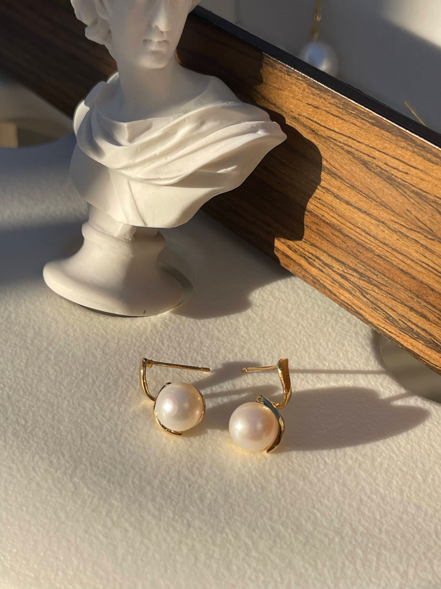 White Freshwater Pearl Swirl Shape Earrings In Sterling Silver